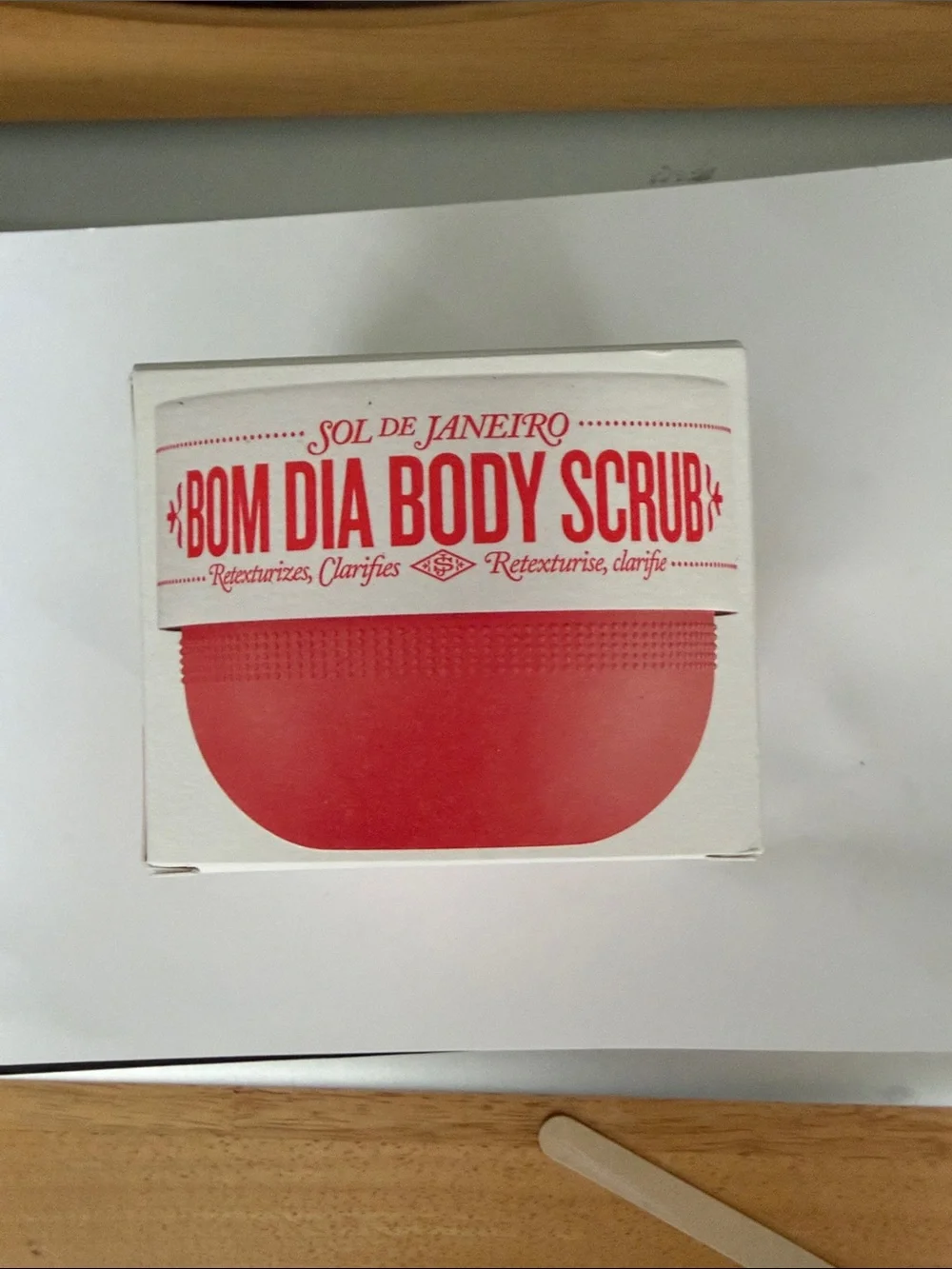Sol de Janeiro Bom Dia Body Scrub in red and white